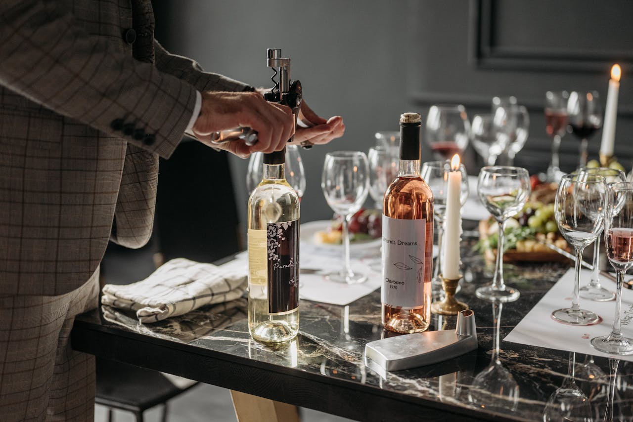 our-story An elegant table setting with wine bottles and glasses ready for a tasting event.